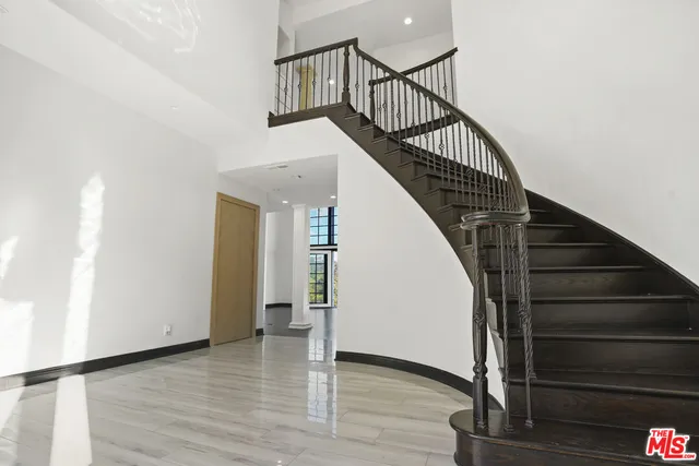 a view of a street with a building in the background