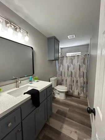 a view of bathroom with dual sinks