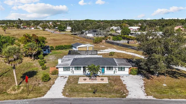 a view of a swimming pool with lounge chair
