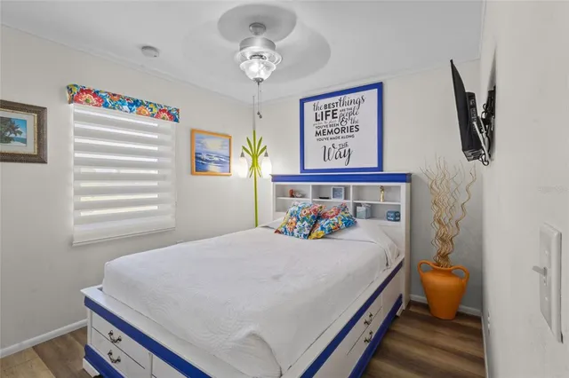 a bathroom with a sink mirror and toilet