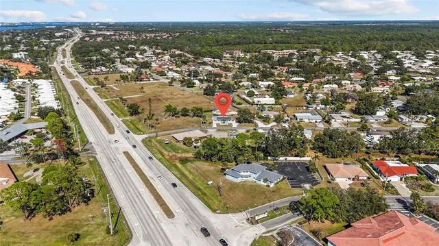 an aerial view of a building with outdoor space