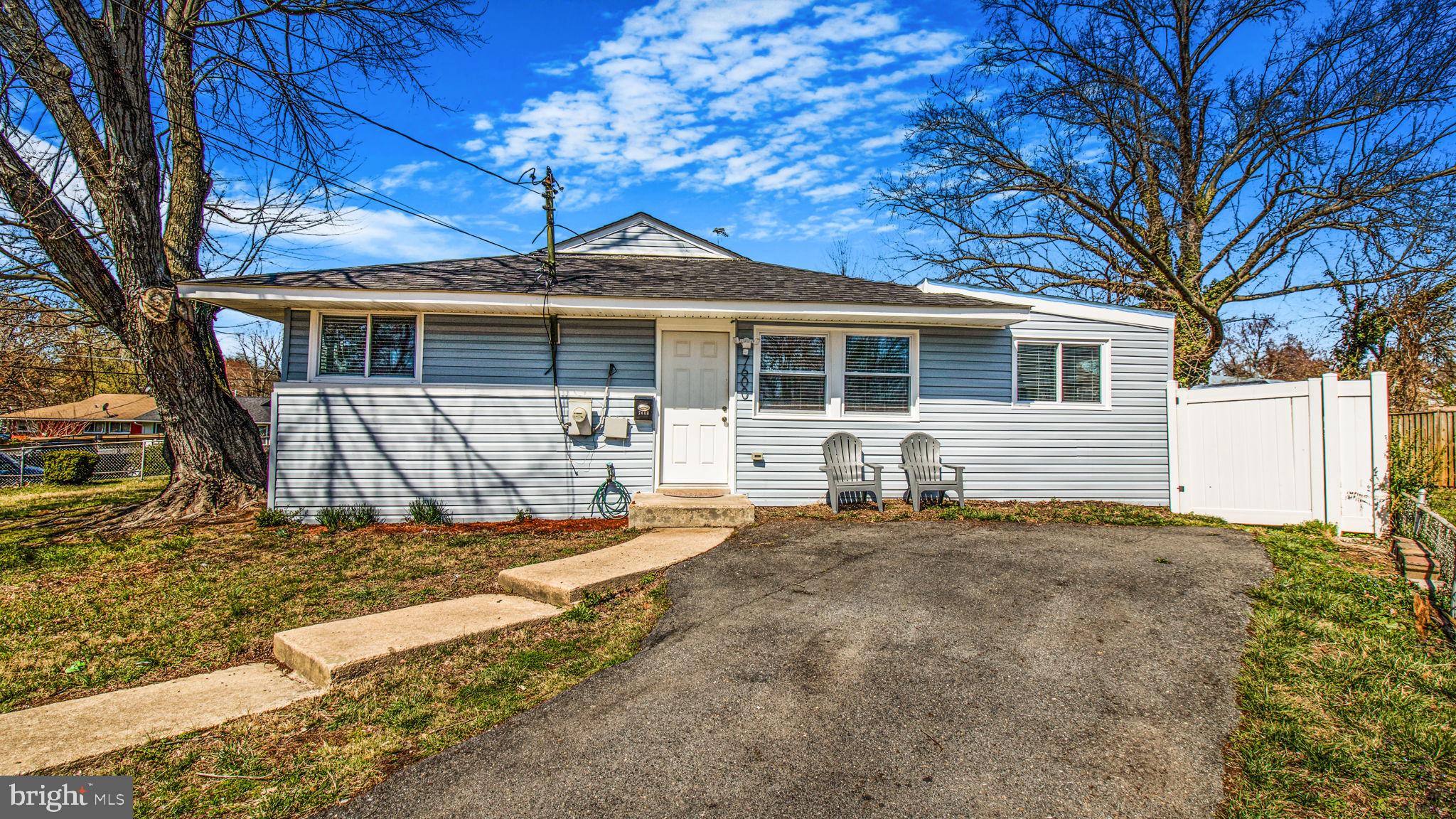 7600 Greenleaf Road Hyattsville, MD 20785 - Photo 2 of 42 a front view of a house with a yard