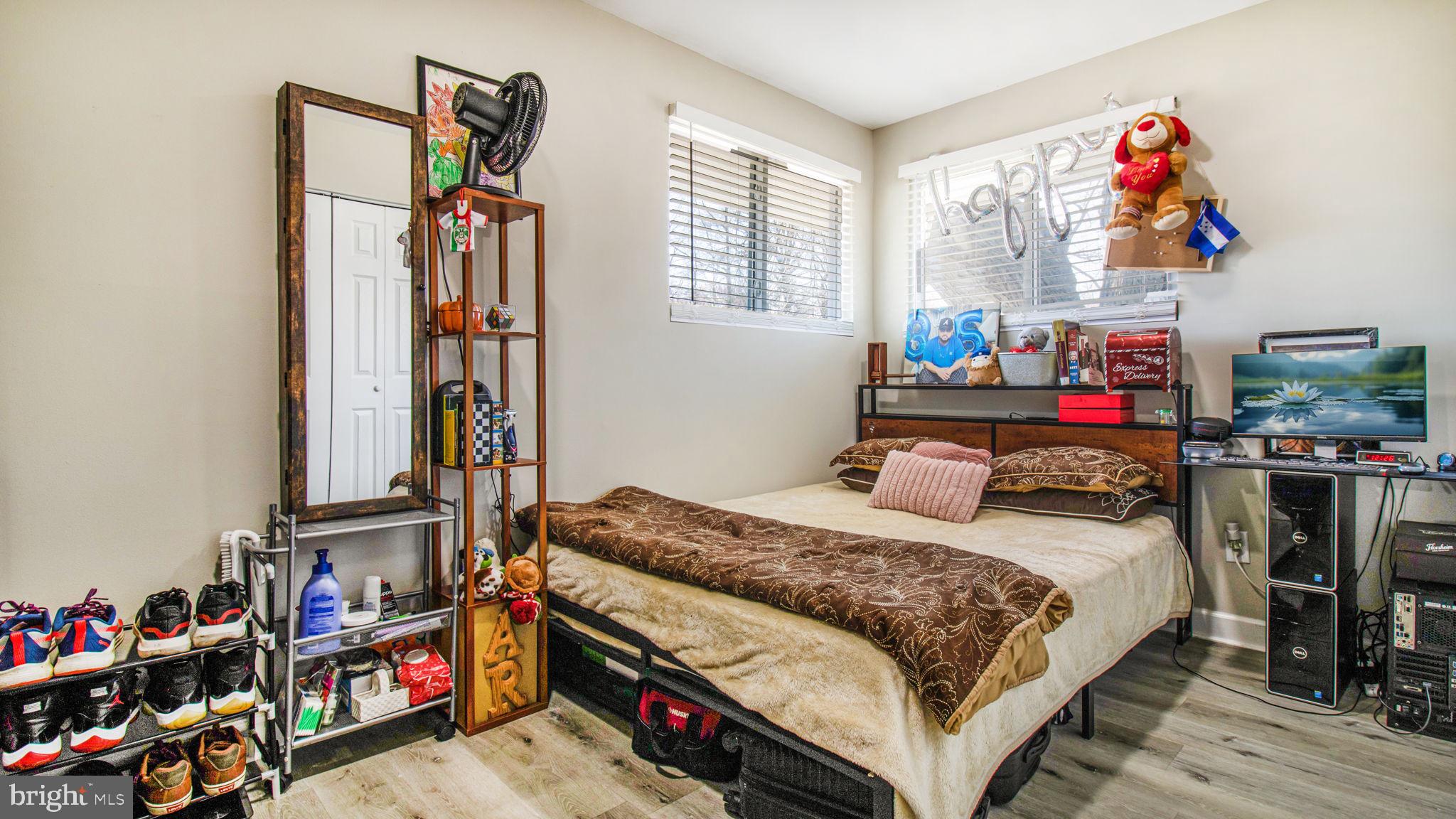 7600 Greenleaf Road Hyattsville, MD 20785 - Photo 22 of 42 a bedroom with bed and a window