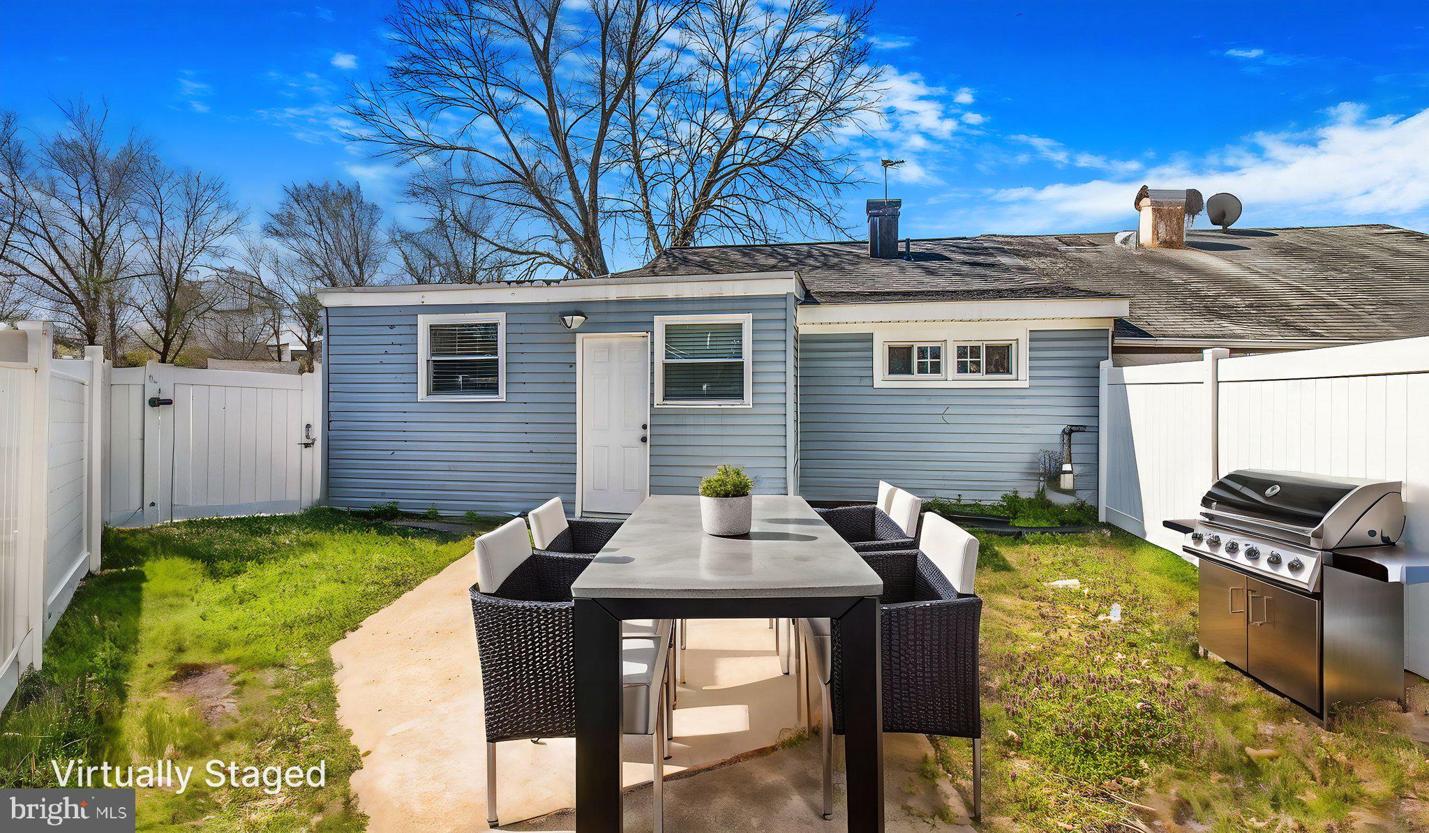 7600 Greenleaf Road Hyattsville, MD 20785 - Photo 34 of 42 a backyard of a house with table and chairs