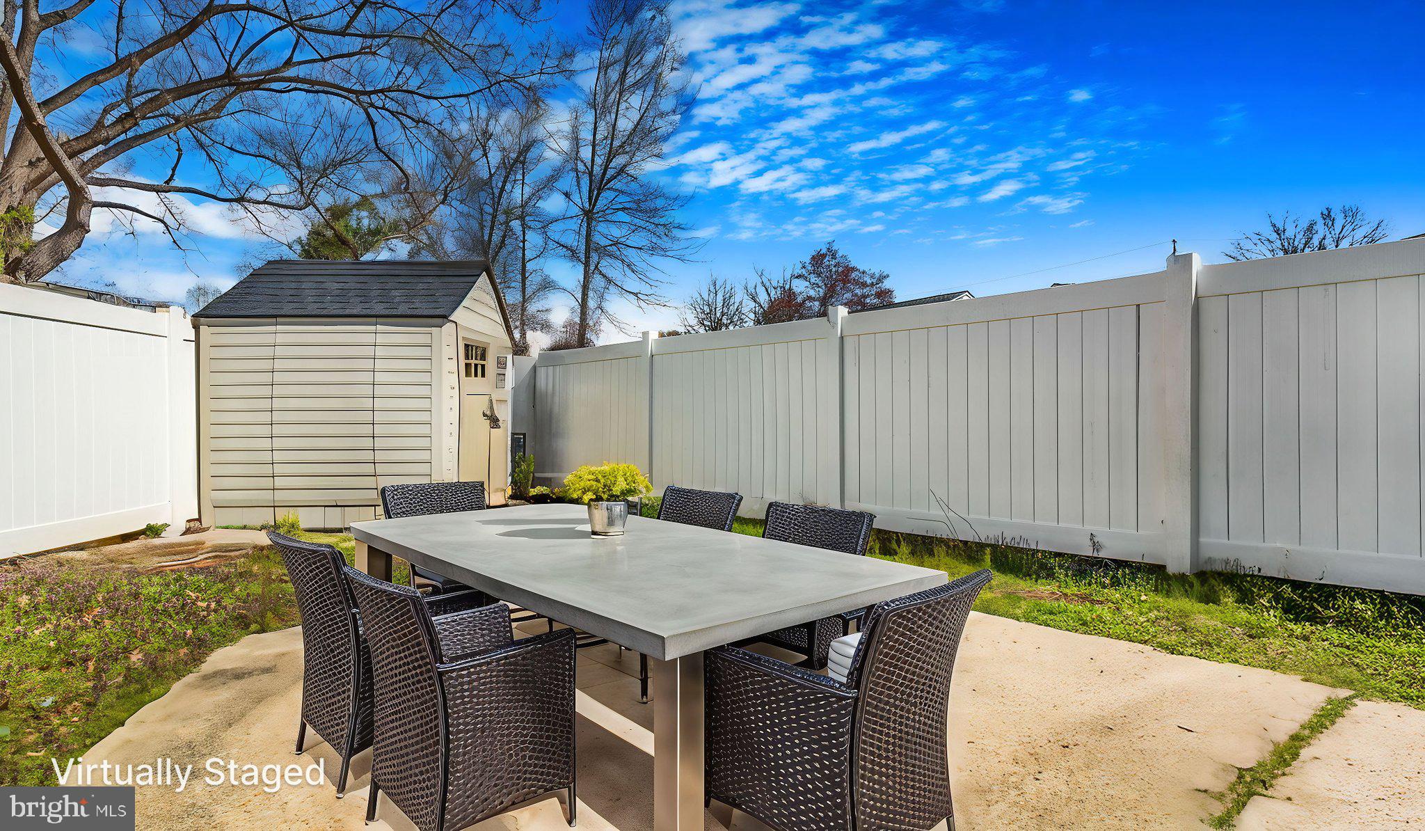 7600 Greenleaf Road Hyattsville, MD 20785 - Photo 39 of 42 a backyard of a house with a table and chairs