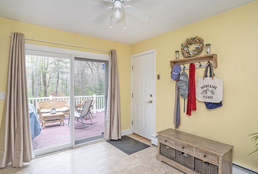 4 Gilmore Road Easton, MA 02356 - Photo 11 of 37 a living room with furniture and a flat screen tv