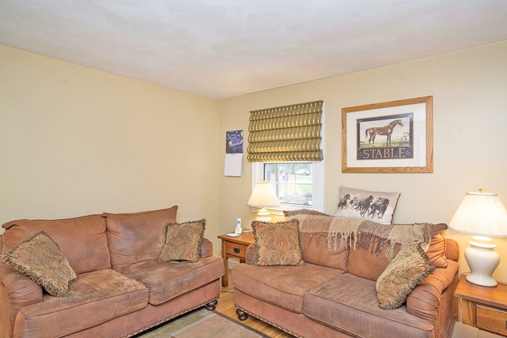4 Gilmore Road Easton, MA 02356 - Photo 19 of 37 a living room with furniture and a large window