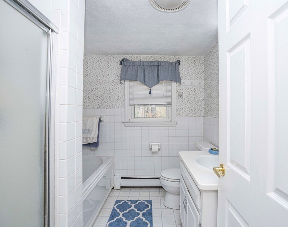 4 Gilmore Road Easton, MA 02356 - Photo 26 of 37 a bathroom with a bathtub sink and toilet