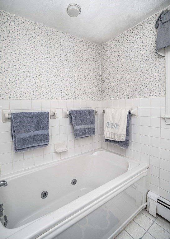4 Gilmore Road Easton, MA 02356 - Photo 27 of 37 a bathroom with a bathtub and shower