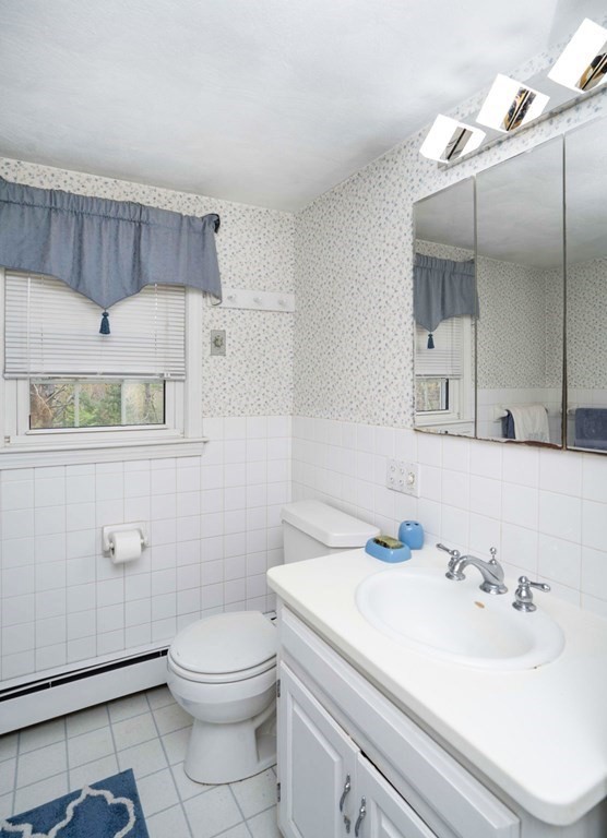4 Gilmore Road Easton, MA 02356 - Photo 28 of 37 a bathroom with a sink a toilet and shower