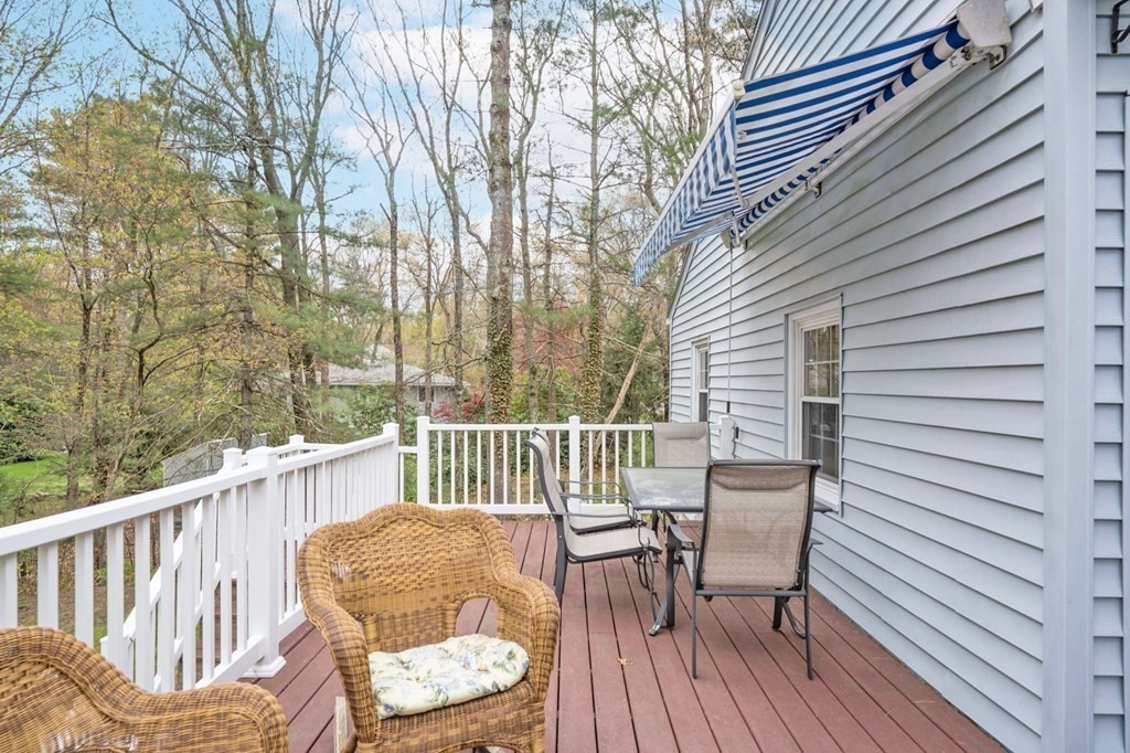 4 Gilmore Road Easton, MA 02356 - Photo 33 of 37 a view of a chair in wooden deck