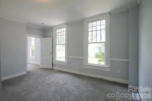 an empty room with windows