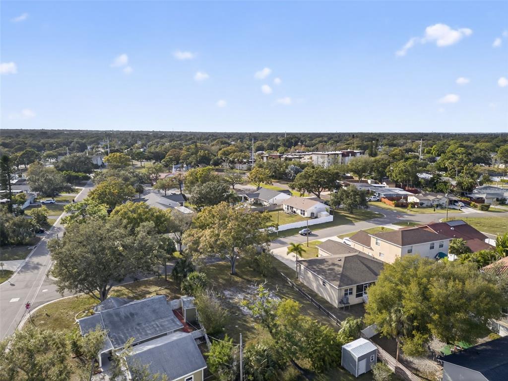 6311 Hobson Street Northeast St. Petersburg, FL 33702 - Photo 14 of 41 an aerial view of residential houses with outdoor space