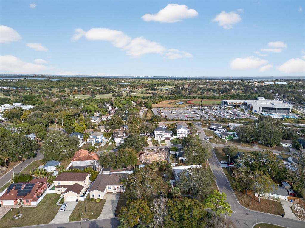 6311 Hobson Street Northeast St. Petersburg, FL 33702 - Photo 18 of 41 an aerial view of residential houses with outdoor space