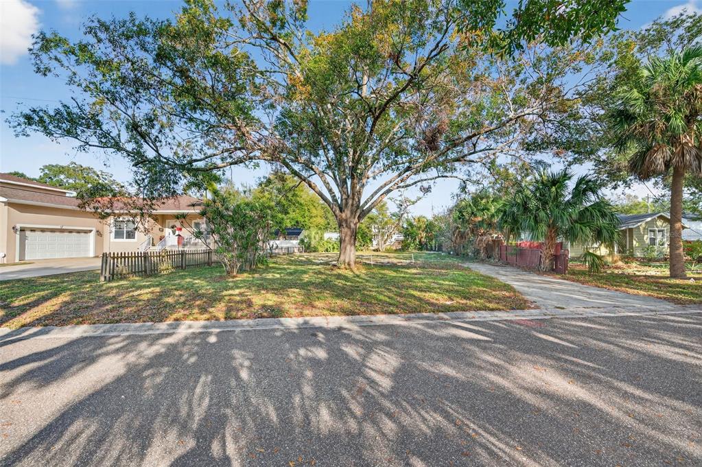 6311 Hobson Street Northeast St. Petersburg, FL 33702 - Photo 2 of 41 a view of yard with tree s