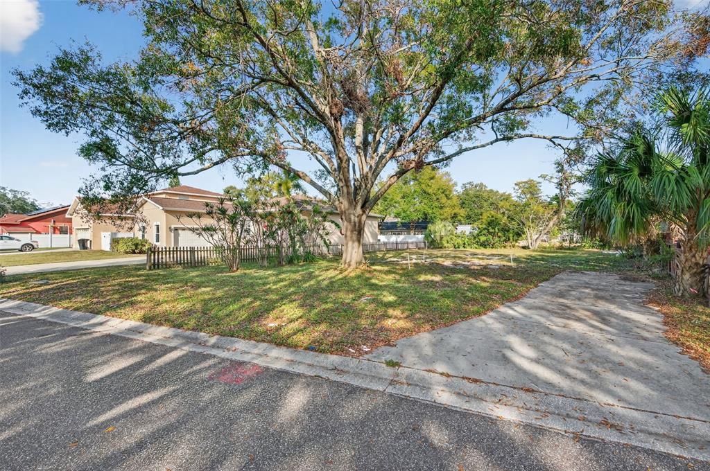 6311 Hobson Street Northeast St. Petersburg, FL 33702 - Photo 3 of 41 a view of yard with swimming pool