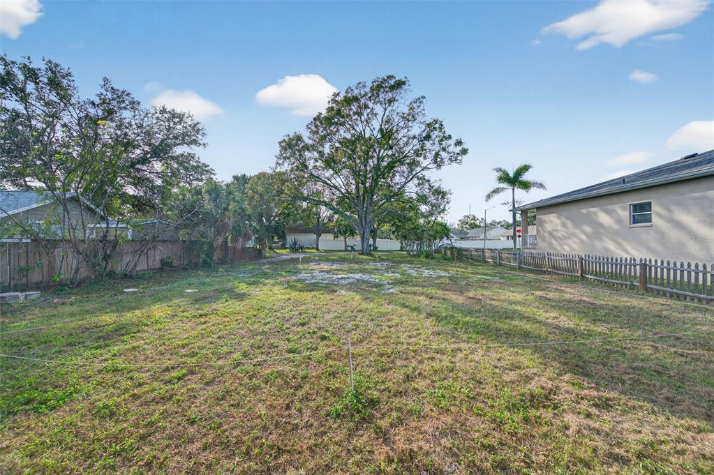6311 Hobson Street Northeast St. Petersburg, FL 33702 - Photo 5 of 41 a view of outdoor space and yard