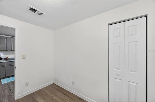 a view of small space with wooden floor