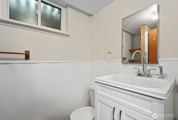 a bathroom with a sink and a toilet