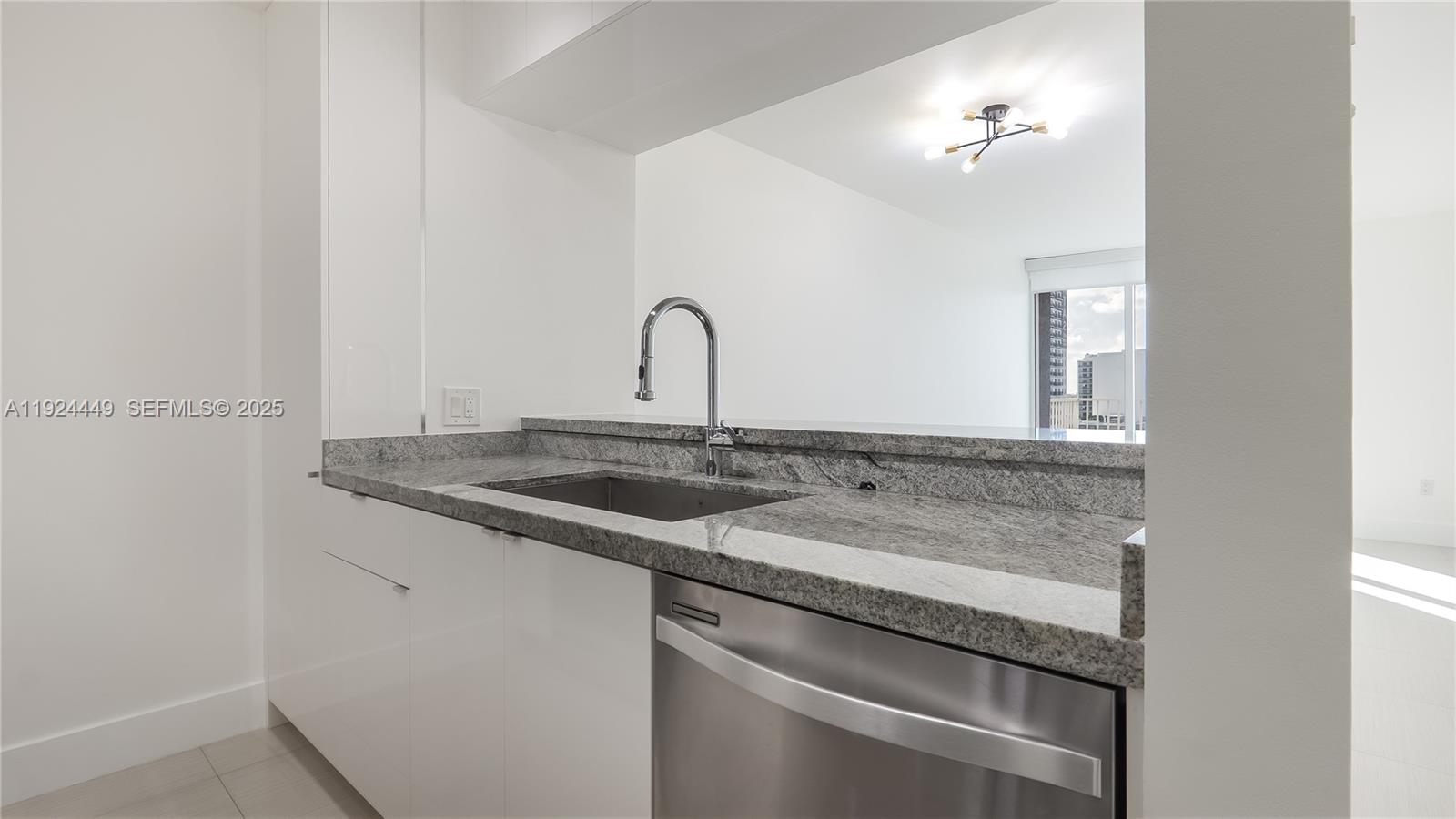 850 North Miami Avenue, Unit W1707 Miami, FL 33136 - Photo 11 of 35 a close view of sink and tap