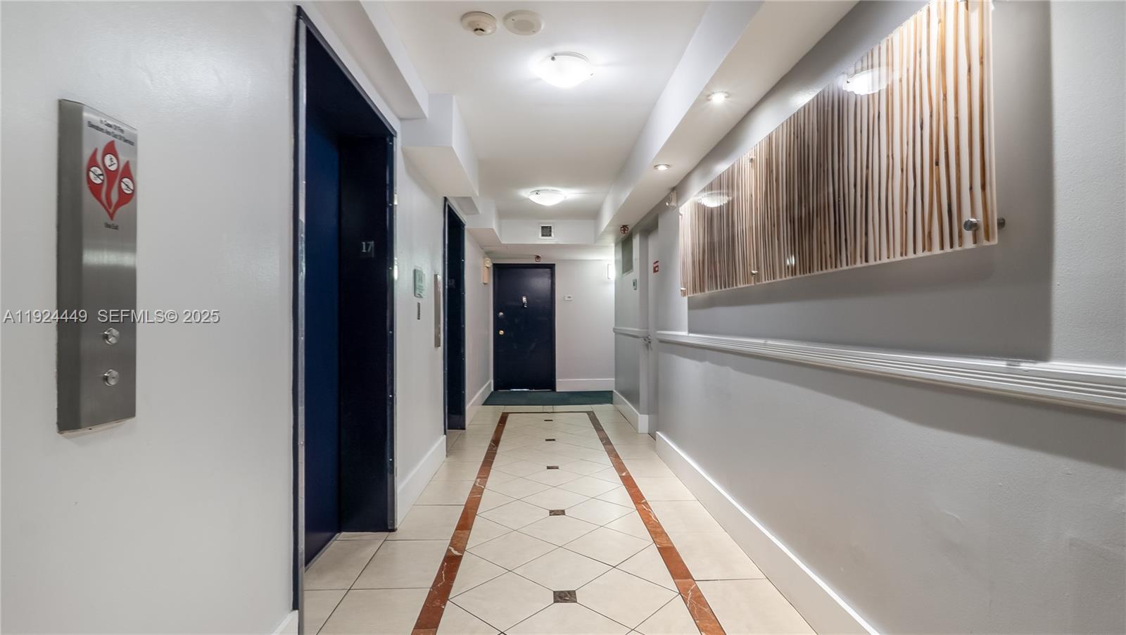 850 North Miami Avenue, Unit W1707 Miami, FL 33136 - Photo 24 of 35 a view of hallway with stairs