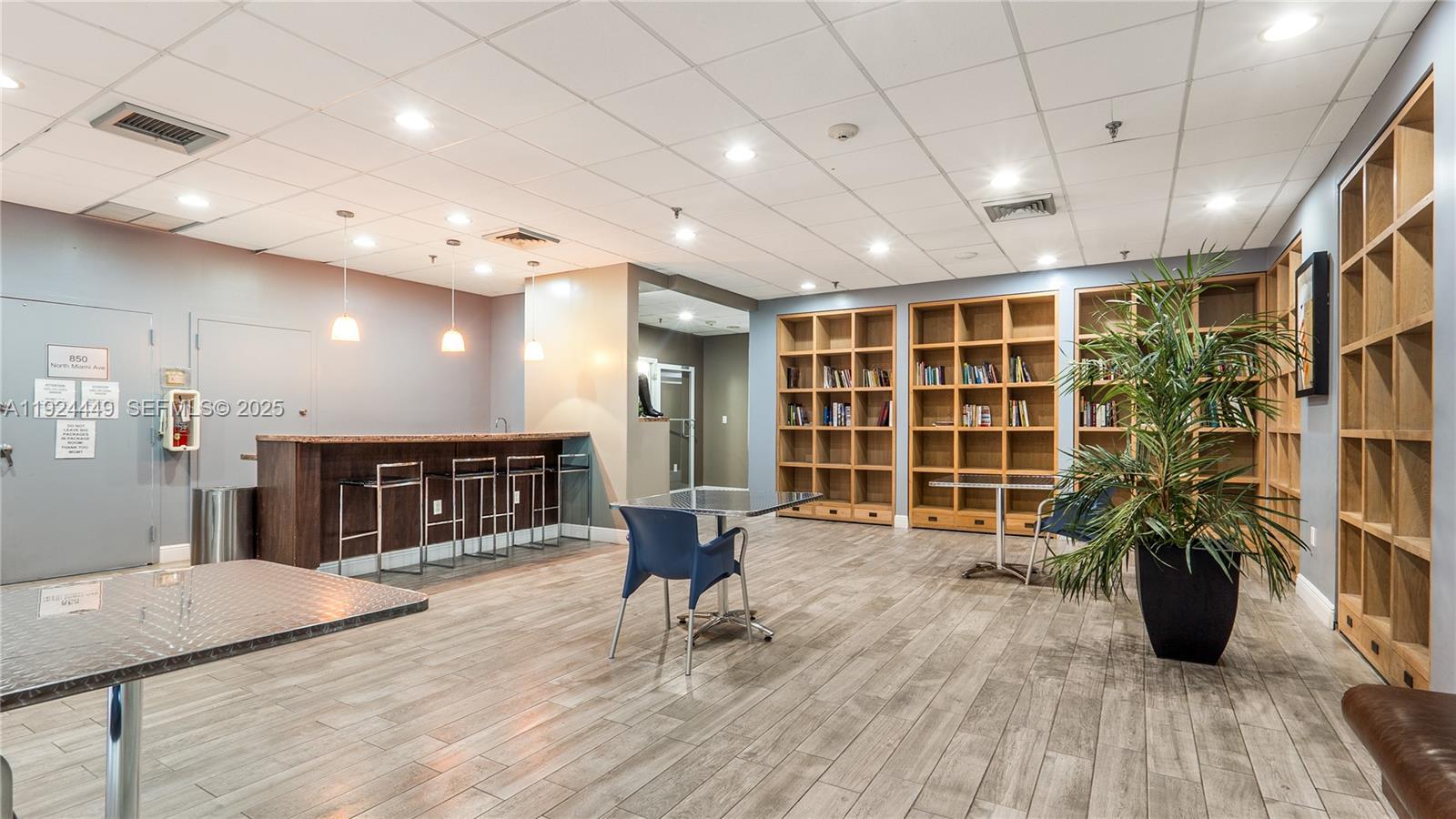 850 North Miami Avenue, Unit W1707 Miami, FL 33136 - Photo 25 of 35 a livingroom with furniture window and wooden floor