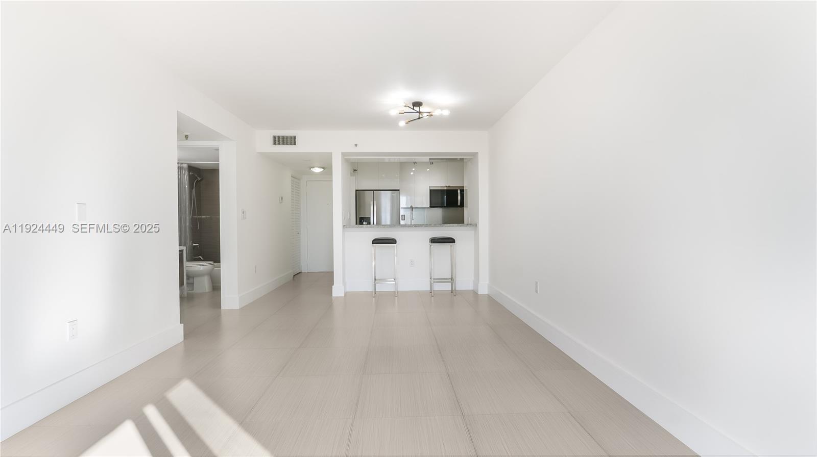 850 North Miami Avenue, Unit W1707 Miami, FL 33136 - Photo 8 of 35 a view of a kitchen with a sink