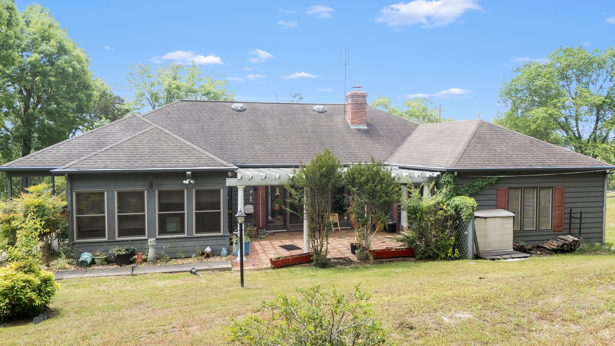 32 Grisham Road Fayetteville, TN 37334 - Photo 10 of 15 a view of a house with backyard porch and sitting area