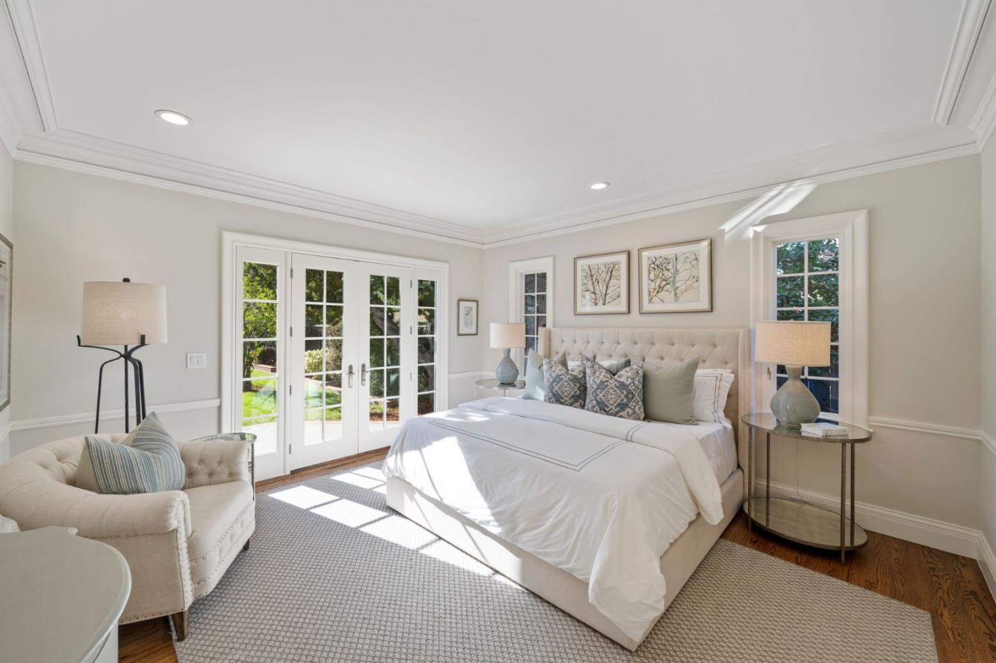 445 Hillcrest Road San Mateo, CA 94402 - Photo 17 of 41 a spacious bedroom with a bed and glass door