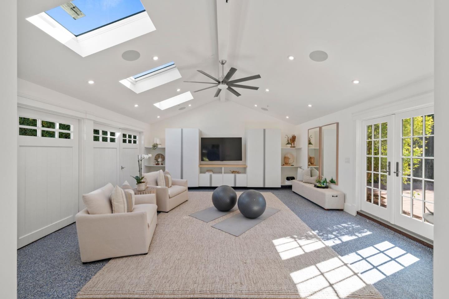 445 Hillcrest Road San Mateo, CA 94402 - Photo 30 of 41 a living room with furniture and a flat screen tv