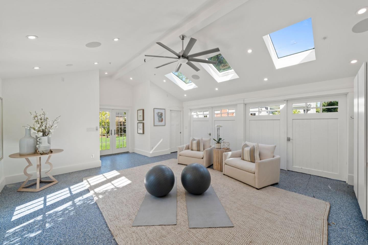 445 Hillcrest Road San Mateo, CA 94402 - Photo 31 of 41 a living room with furniture and a chandelier