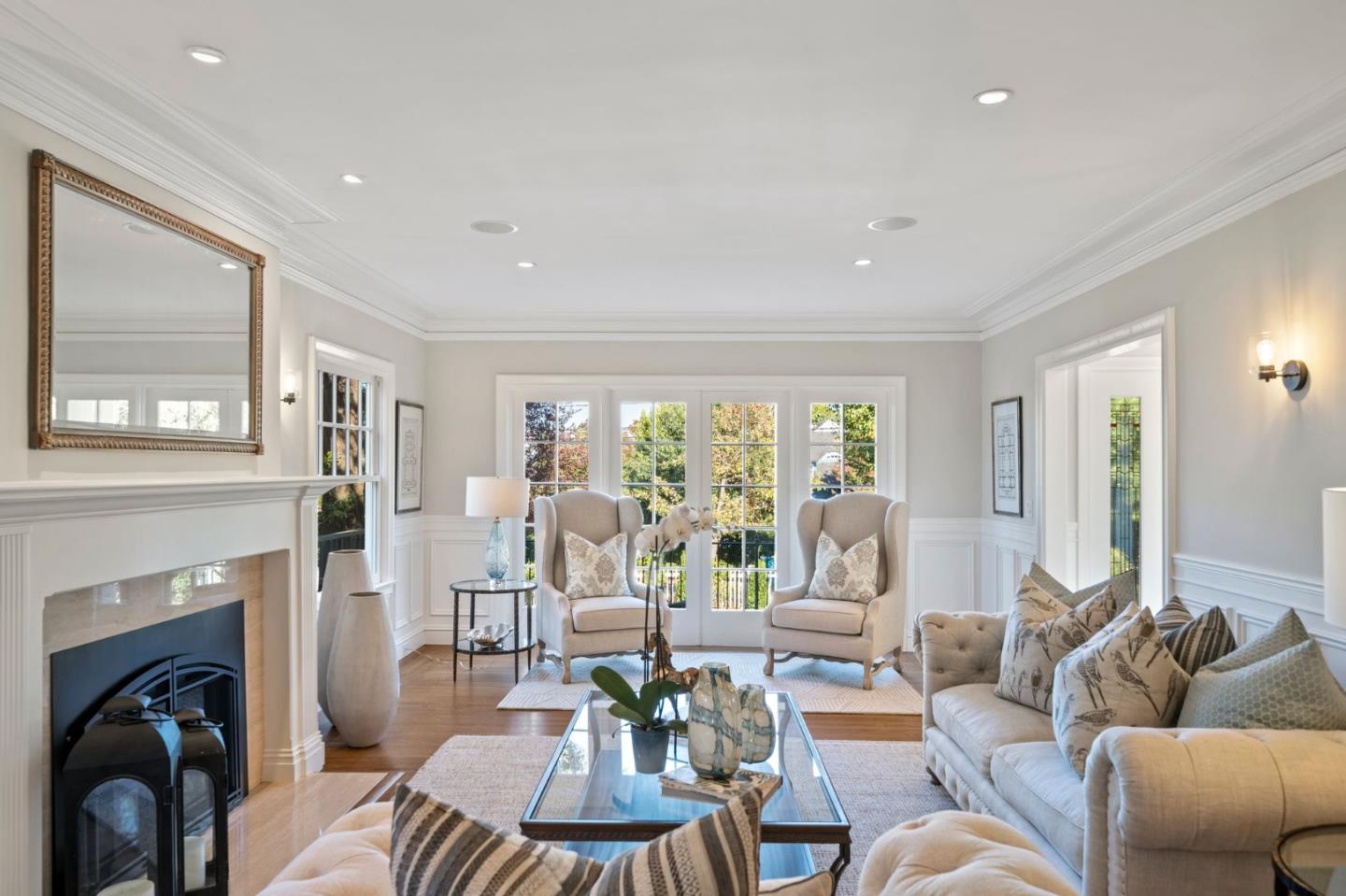 445 Hillcrest Road San Mateo, CA 94402 - Photo 6 of 41 a living room with furniture fireplace and a large window