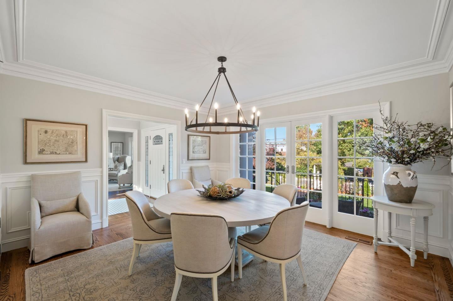 445 Hillcrest Road San Mateo, CA 94402 - Photo 8 of 41 a dining room with furniture a chandelier and window