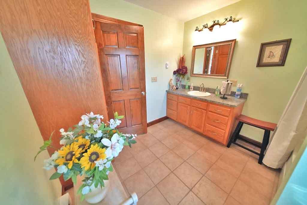 217 Campbell Road New Limerick, ME 04761 - Photo 29 of 92 tile-floor-bath-one