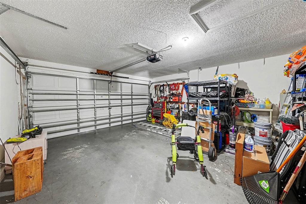 3267 Guava Lane Spring Hill, FL 34609 - Photo 25 of 30 a view of a storage room with racks