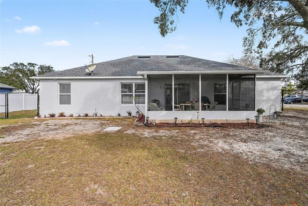 3267 Guava Lane Spring Hill, FL 34609 - Photo 26 of 30 front view of a house with a yard