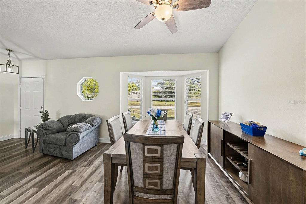 3267 Guava Lane Spring Hill, FL 34609 - Photo 8 of 30 a living room with furniture and wooden floor