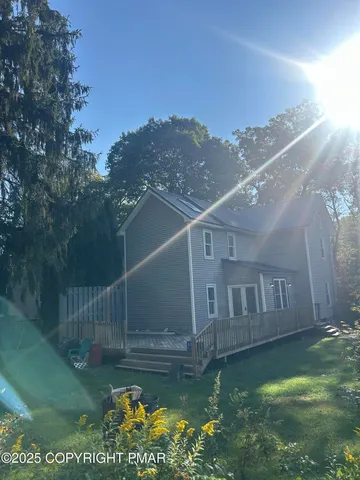 a view of yard with swimming pool and mountain view in back