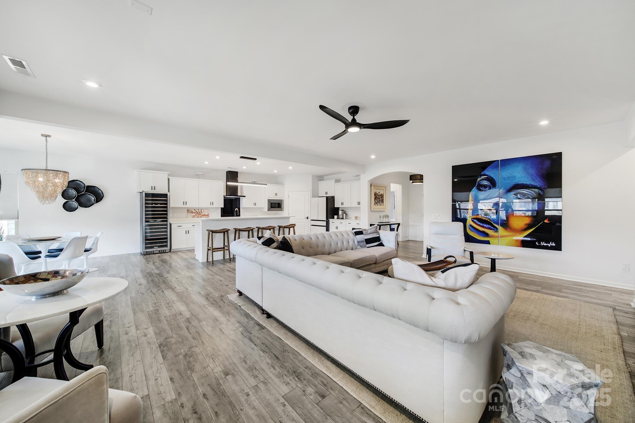 3135 Bartlett Street Fort Mill, SC 29715 - Photo 13 of 43 a living room with furniture and a flat screen tv