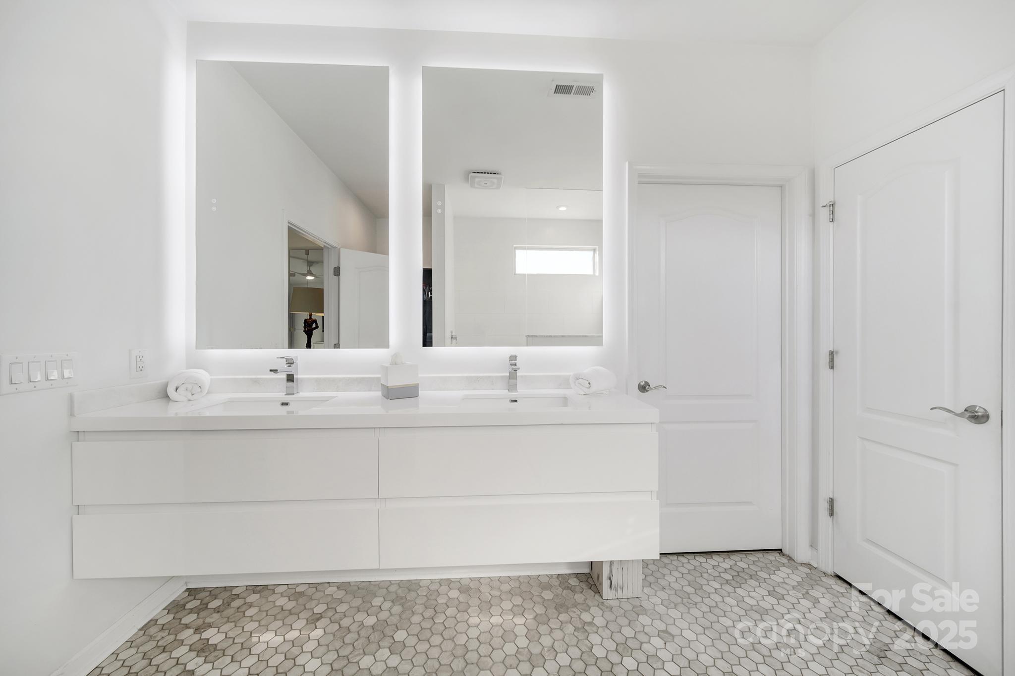 3135 Bartlett Street Fort Mill, SC 29715 - Photo 17 of 43 a bathroom with a sink and a mirror