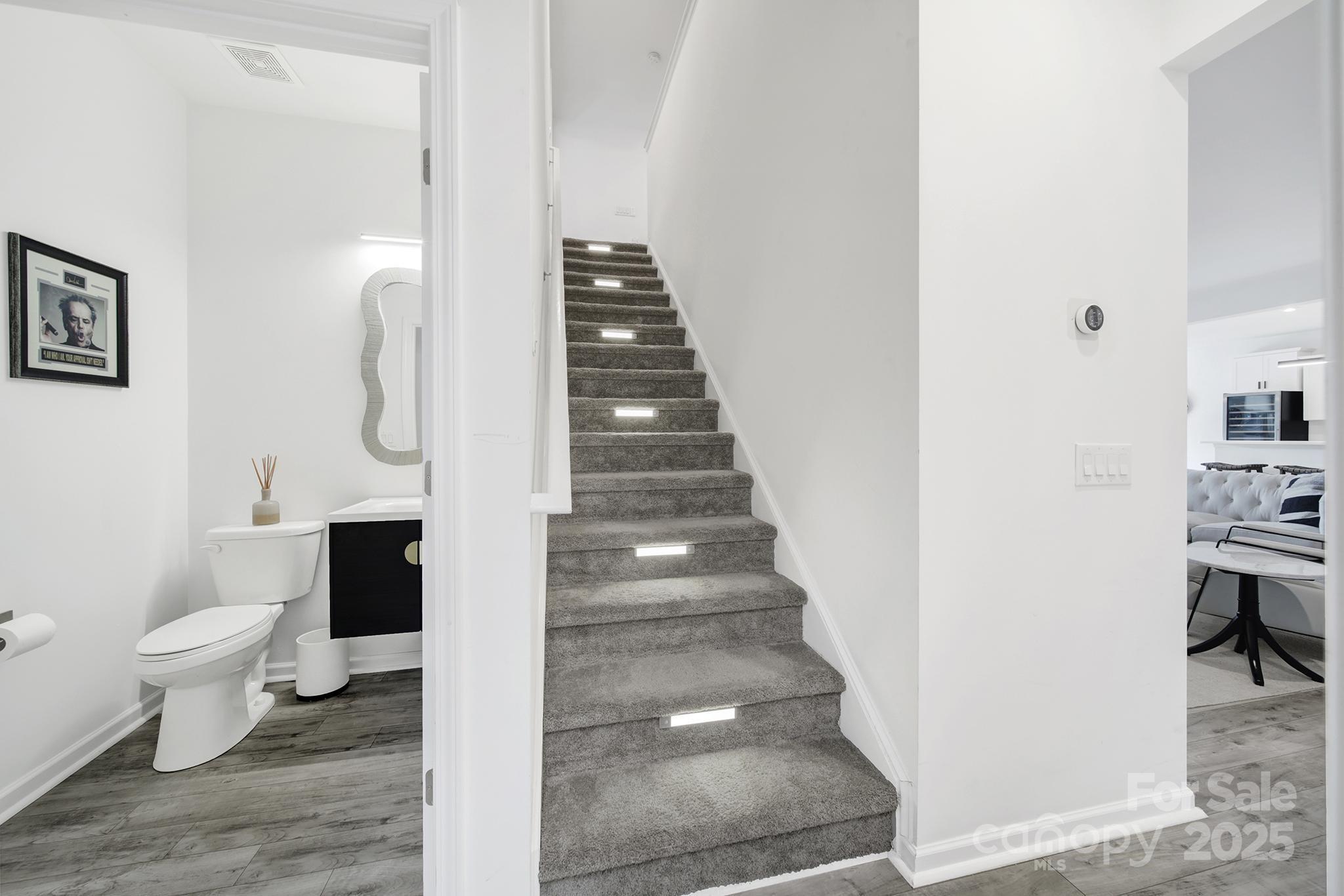 3135 Bartlett Street Fort Mill, SC 29715 - Photo 22 of 43 a view of a hallway with wooden floor and entryway