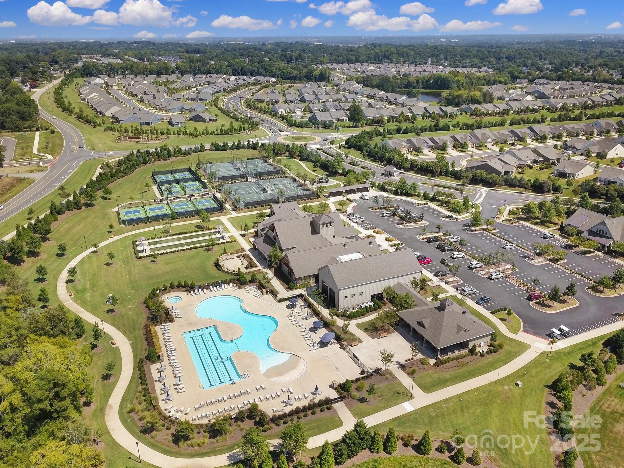 3135 Bartlett Street Fort Mill, SC 29715 - Photo 40 of 43 an aerial view of residential houses with outdoor space