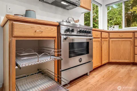 a view of a kitchen with washer and dryer