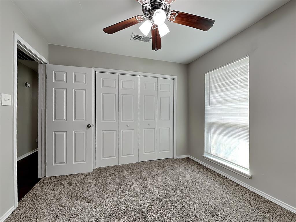 7621 Pebble Beach Drive Rowlett, TX 75088 - Photo 16 of 20 a view of an empty room with a window