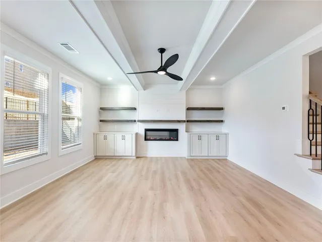 a view of a kitchen with a sink cabinets and a window