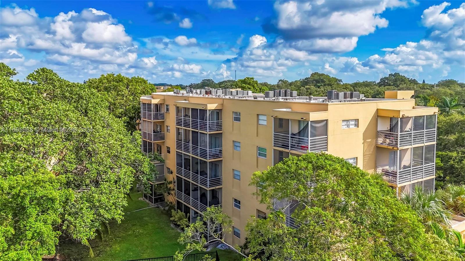4111 Stirling Road, Unit 304 Fort Lauderdale, FL 33314 - Photo 16 of 22 front view of a house with a yard