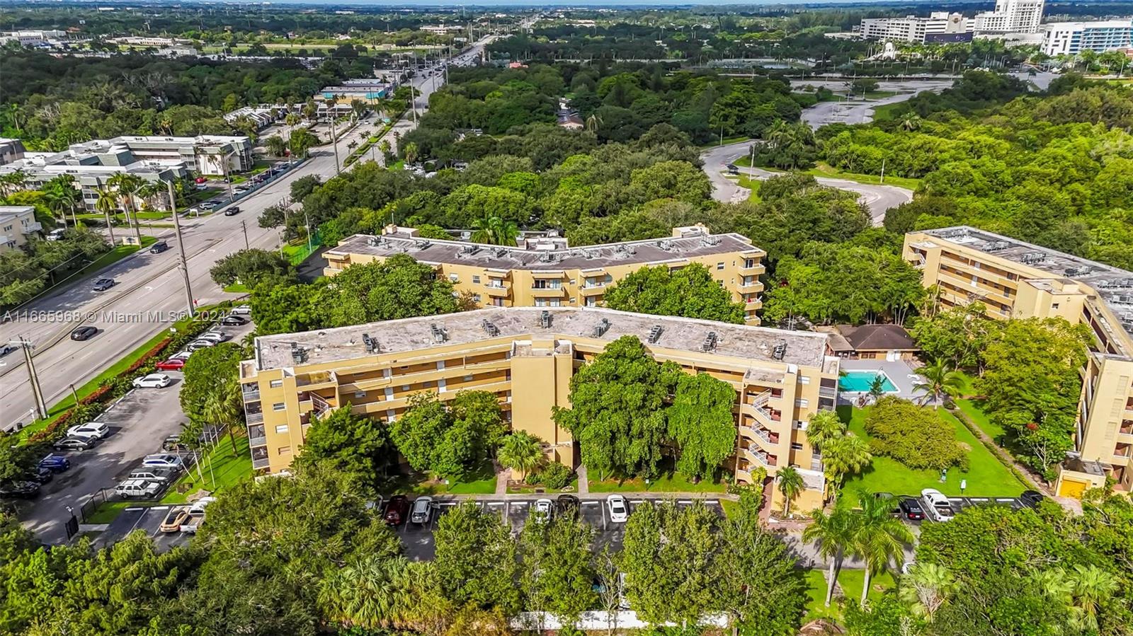 4111 Stirling Road, Unit 304 Fort Lauderdale, FL 33314 - Photo 19 of 22 an aerial view of residential house with outdoor space and trees all around