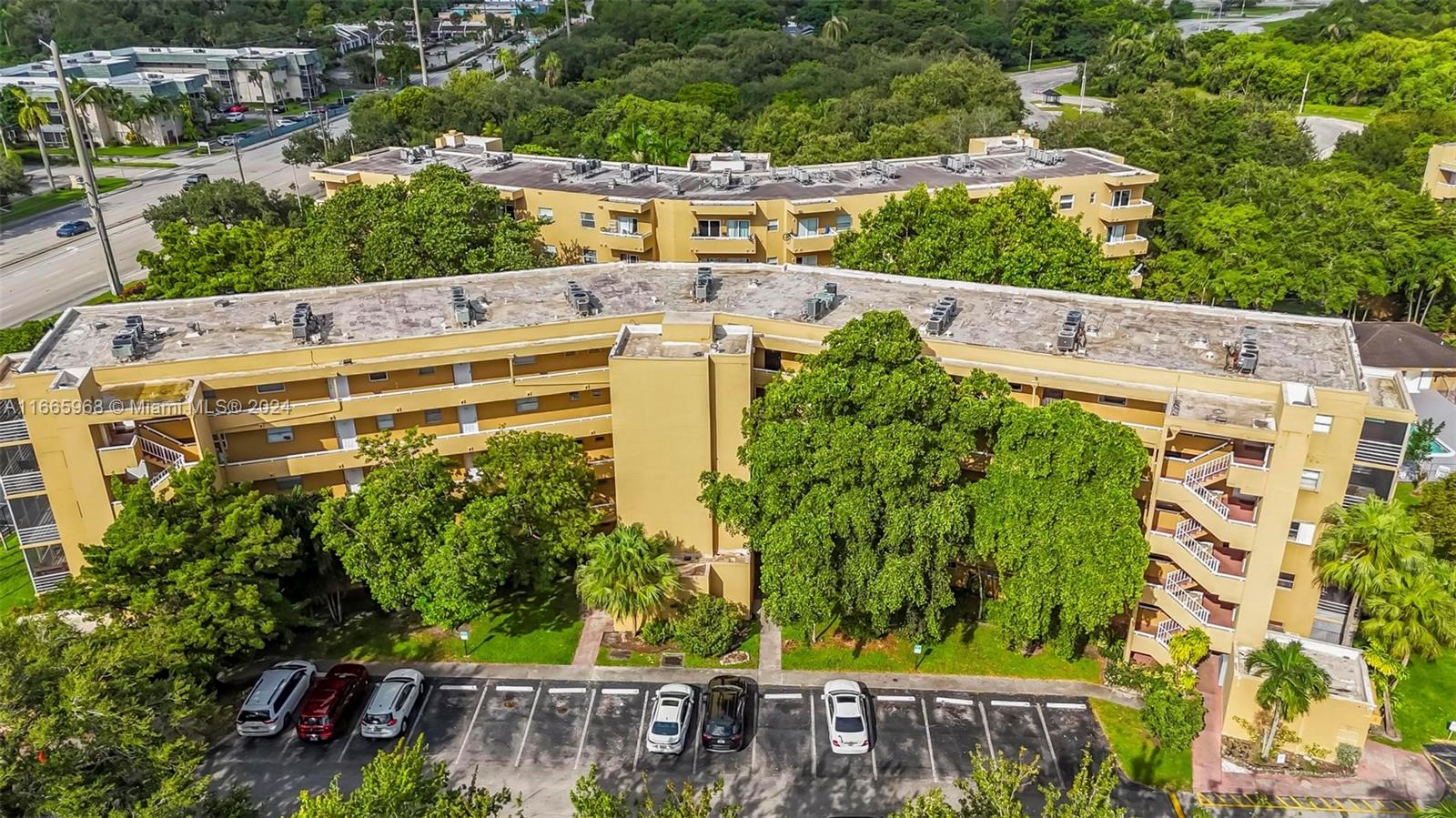 4111 Stirling Road, Unit 304 Fort Lauderdale, FL 33314 - Photo 20 of 22 an aerial view of residential house with outdoor space and trees all around