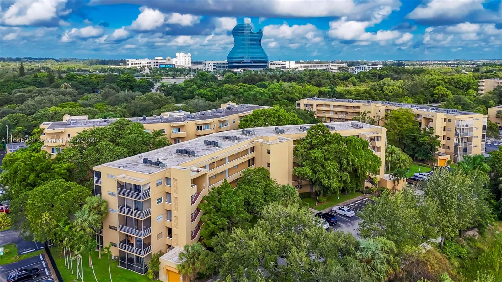 4111 Stirling Road, Unit 304 Fort Lauderdale, FL 33314 - Photo 2 of 22 an aerial view of residential houses with outdoor space and trees