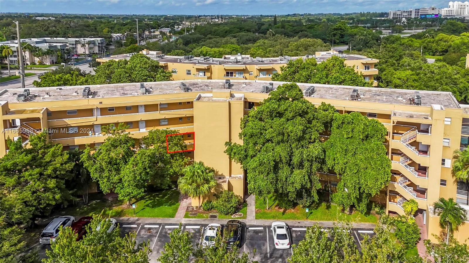 4111 Stirling Road, Unit 304 Fort Lauderdale, FL 33314 - Photo 21 of 22 an aerial view of a house with a yard and lake view